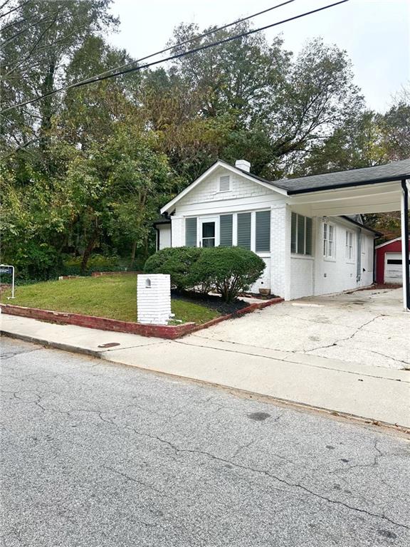 front view of a house with a yard