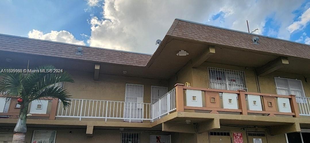 a front view of a building with balcony