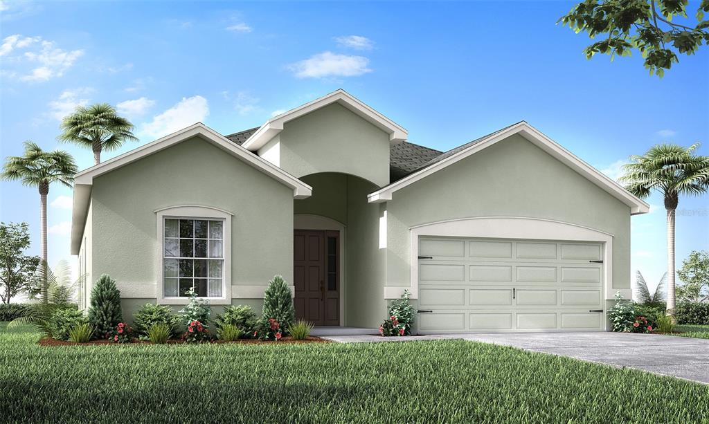 a front view of house with yard and green space