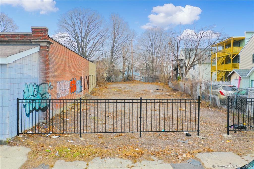 a view of a wrought iron fences in front of house