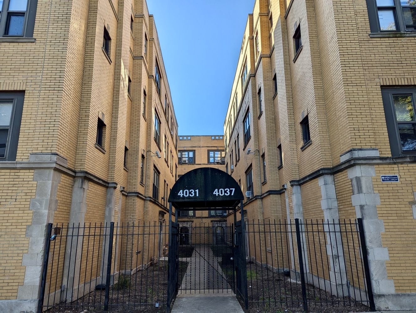 a view of a brick building with front door