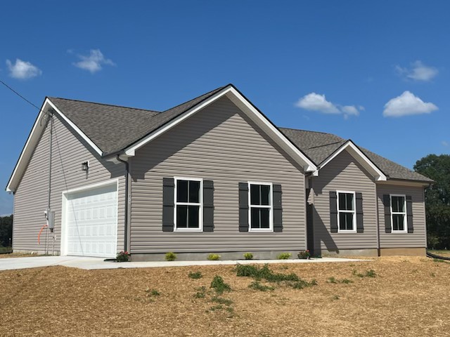 a house with trees in the background