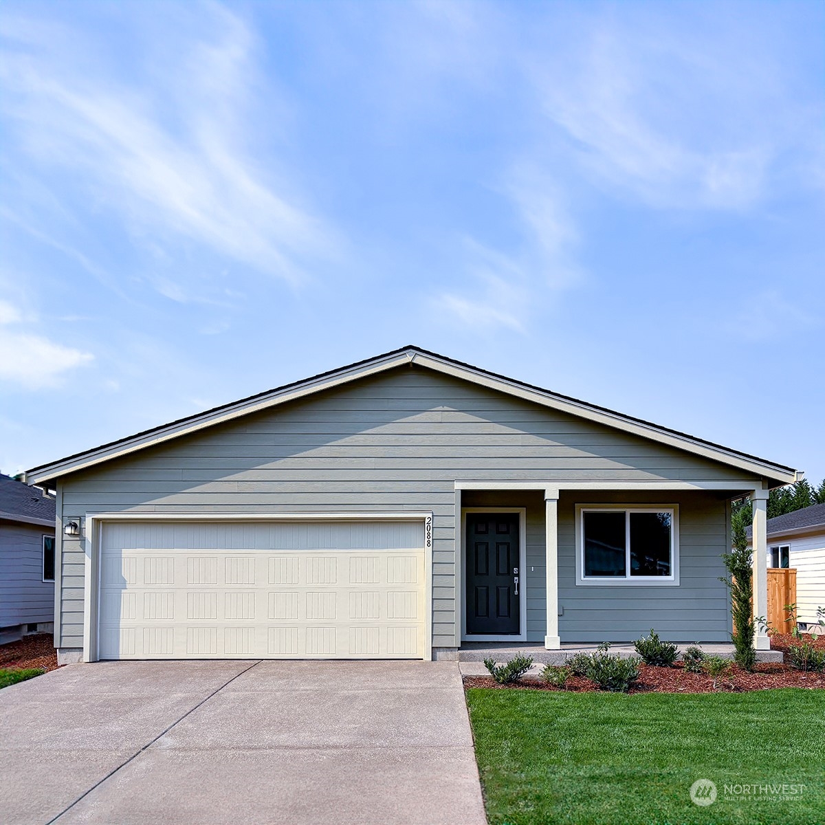 a front view of house with yard