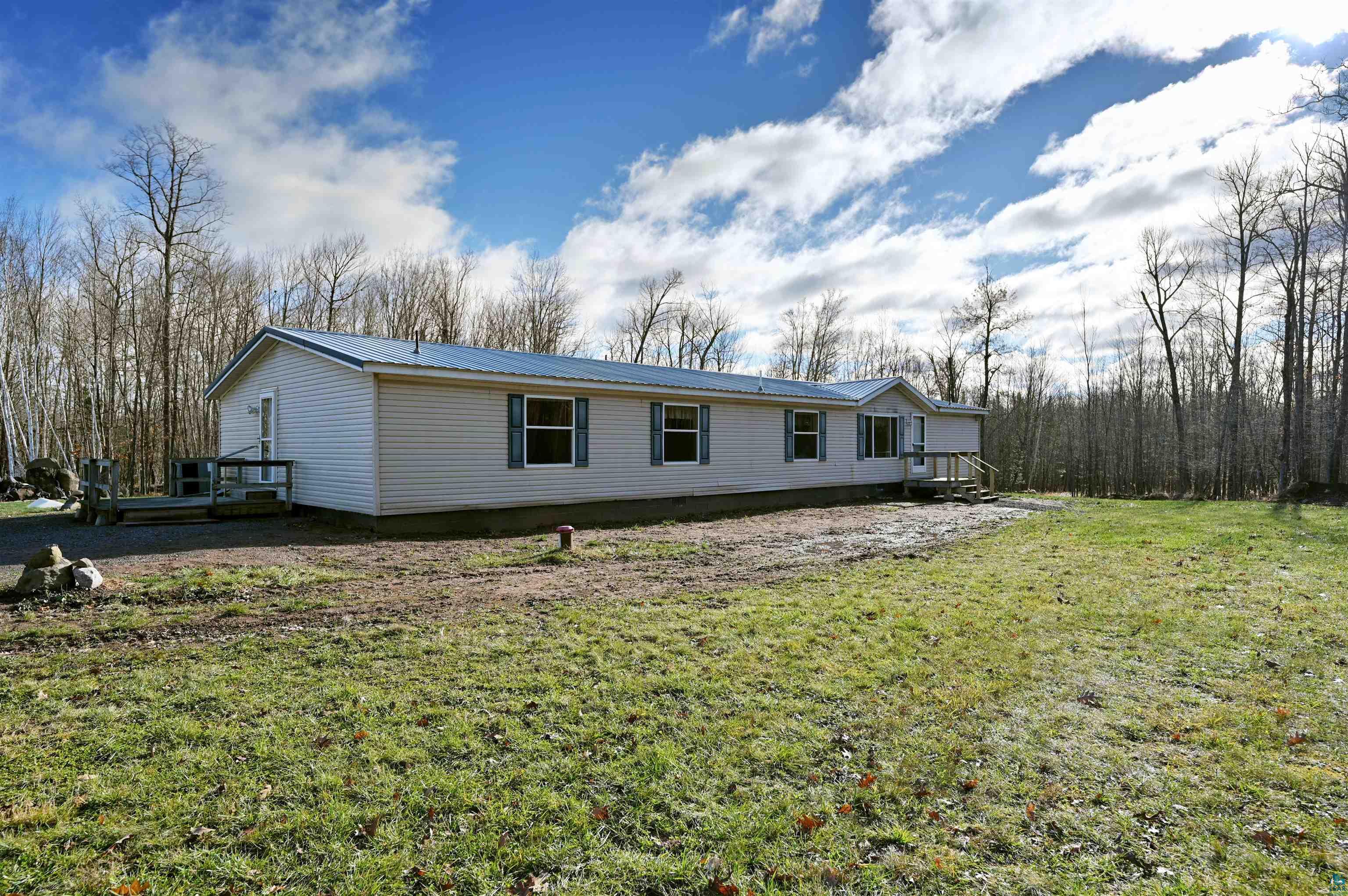 Exterior space with a front lawn