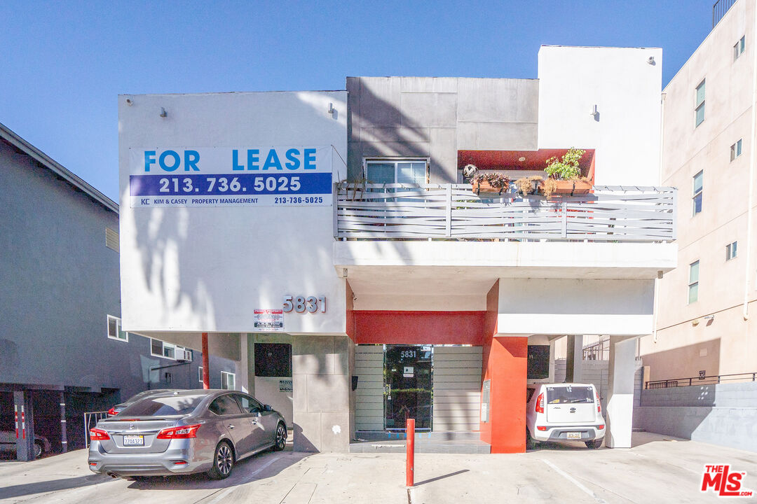 a car parked in front of a building