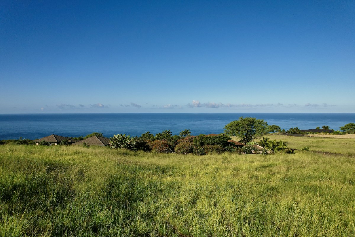 a view of a lake with a house