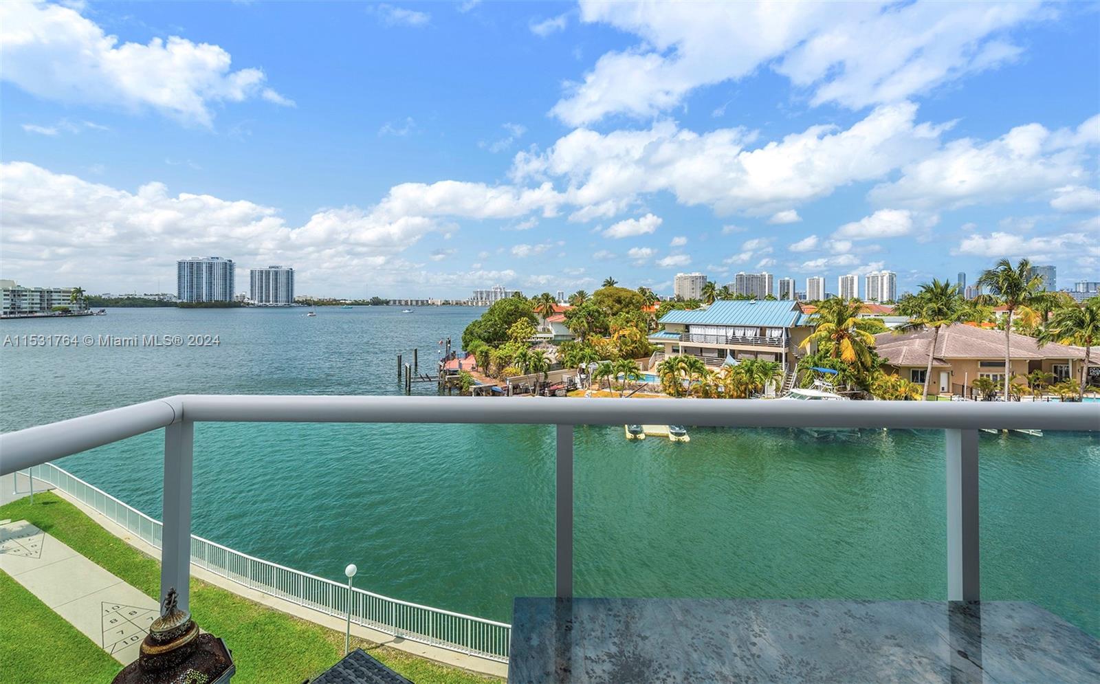 a view of a lake from a balcony