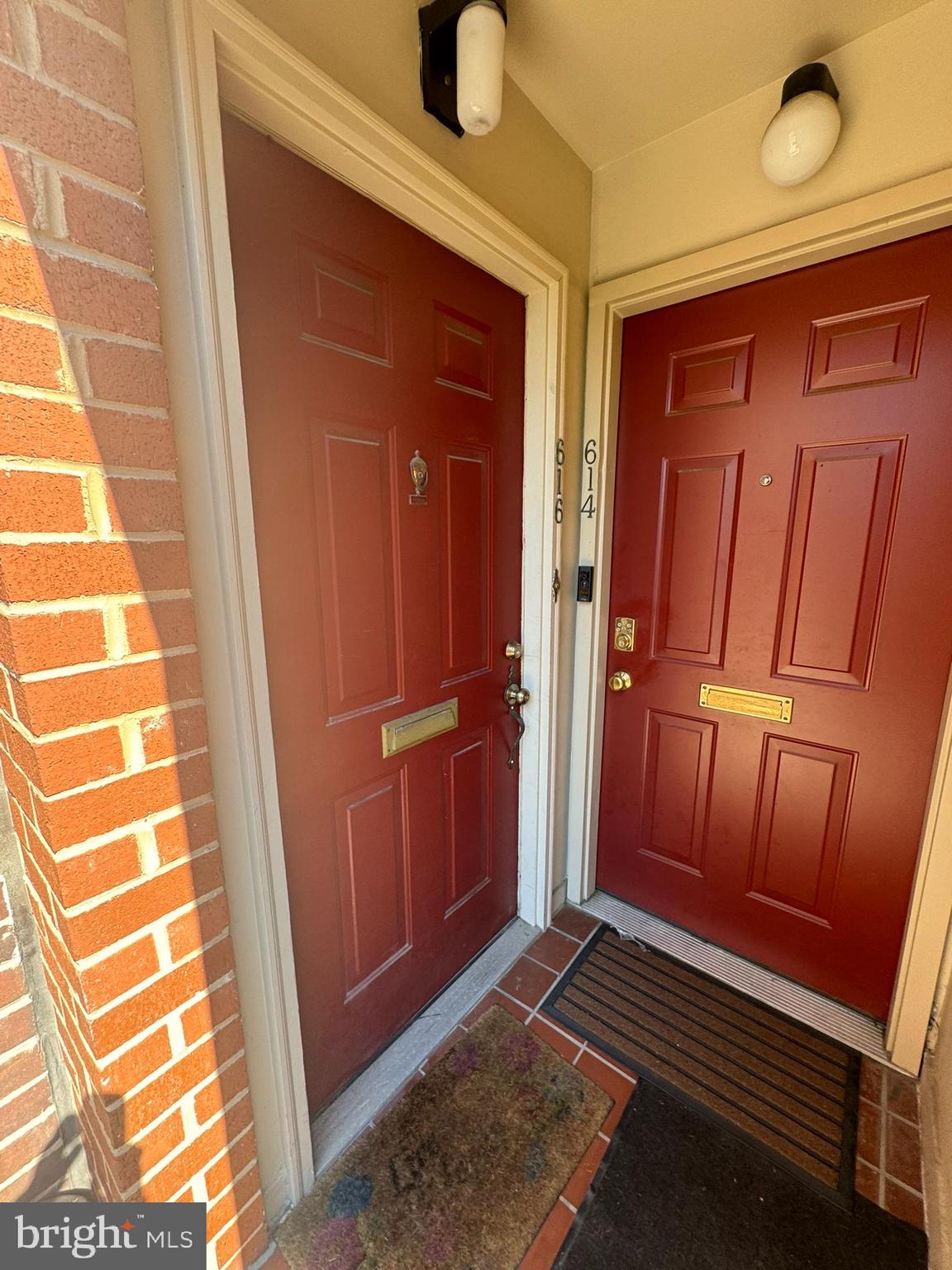 a view of front door with wooden floor