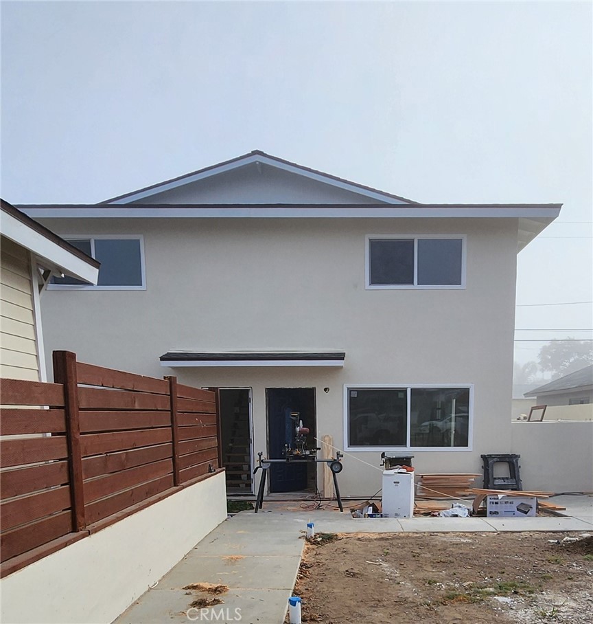 a front view of a house with outdoor space