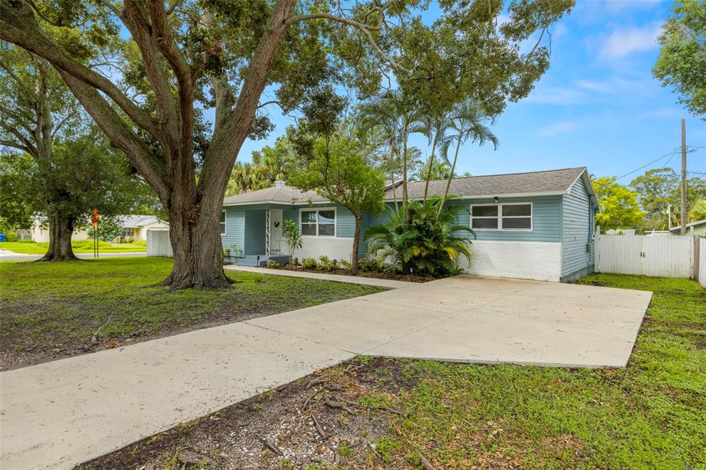 front view of a house with a yard