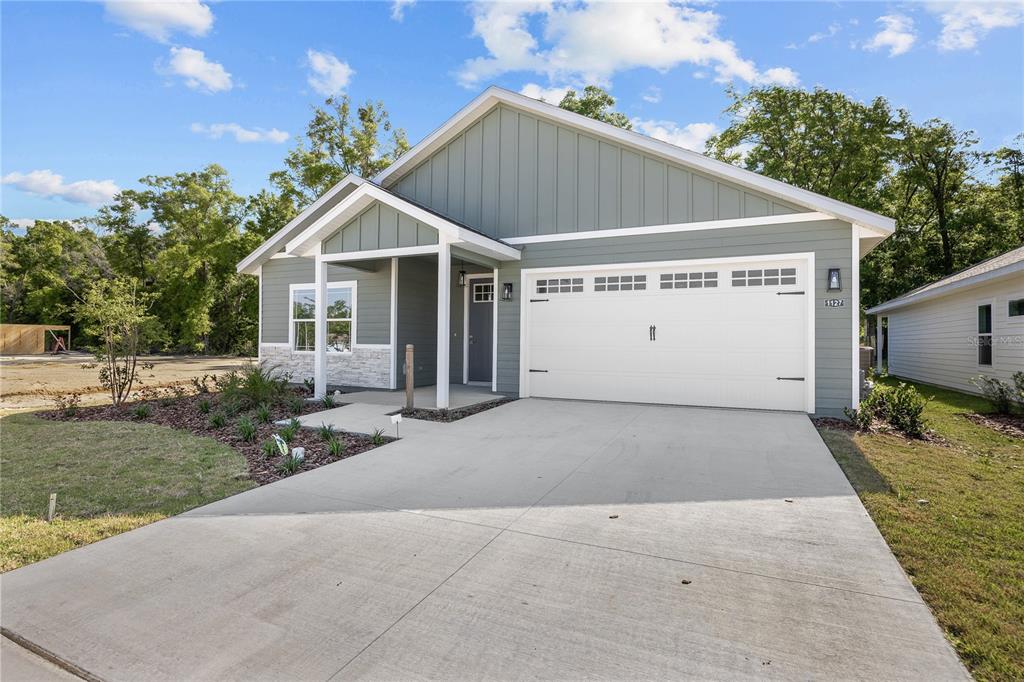 a house with trees in the background