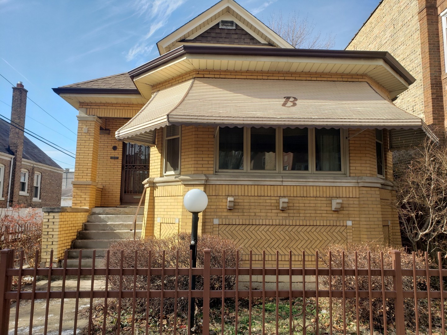 a front view of a house with parking