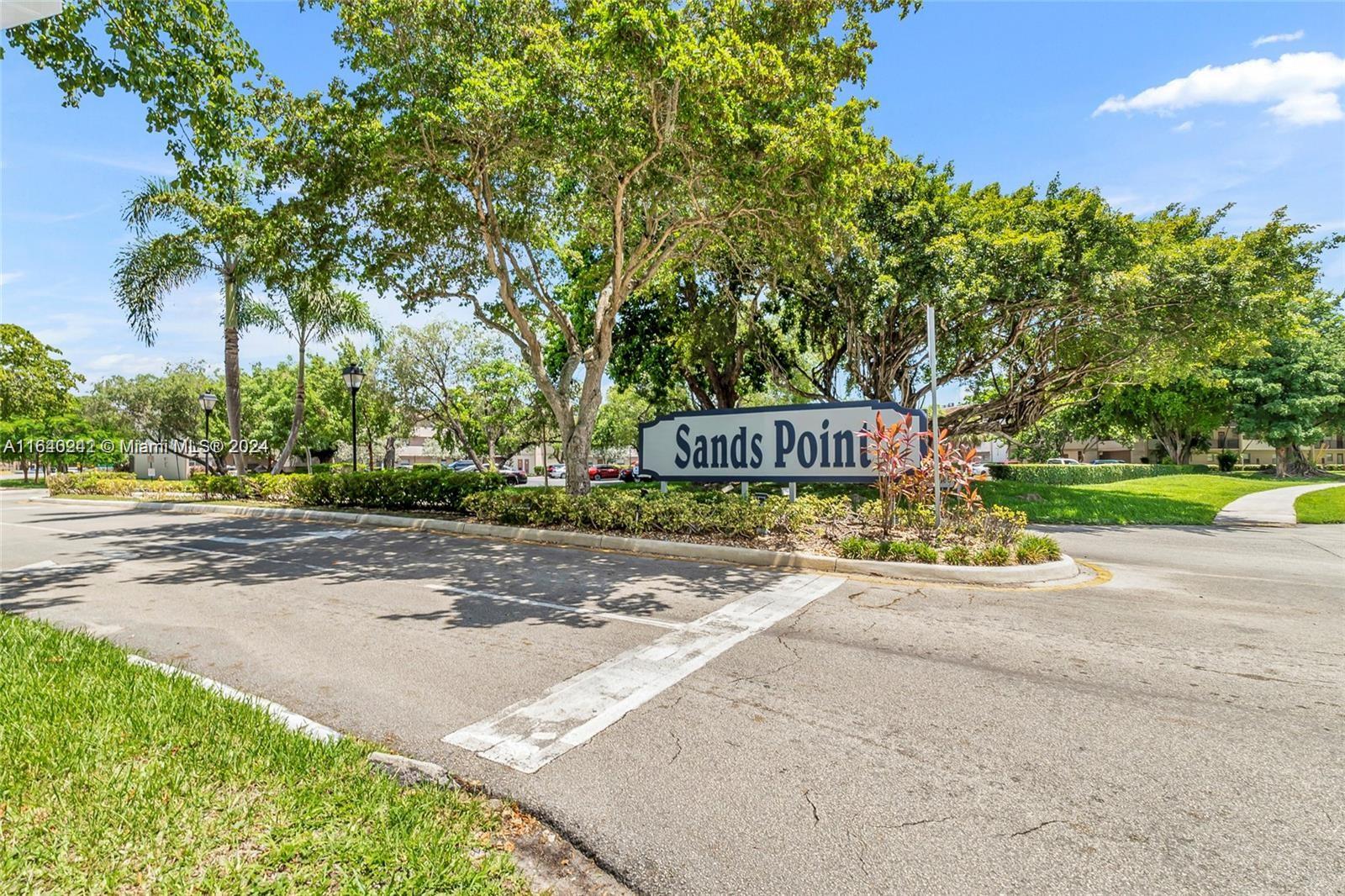 a sign board with parking space