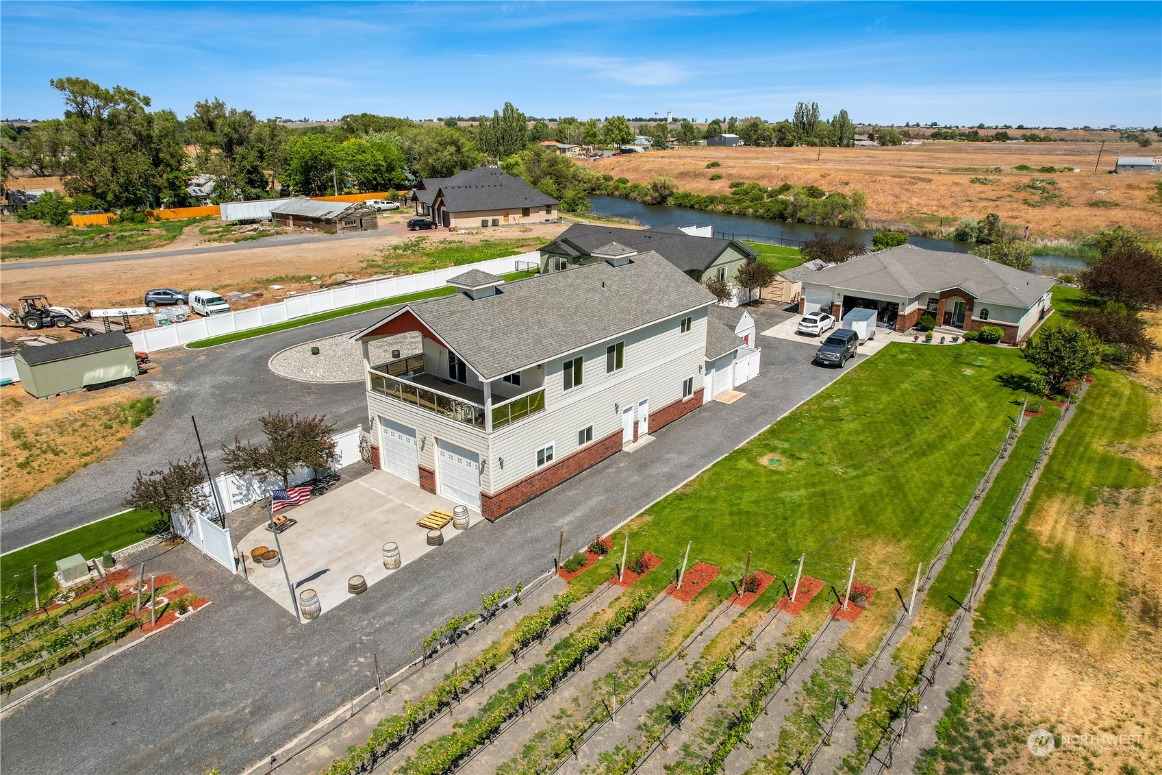 an aerial view of a house with a ocean view