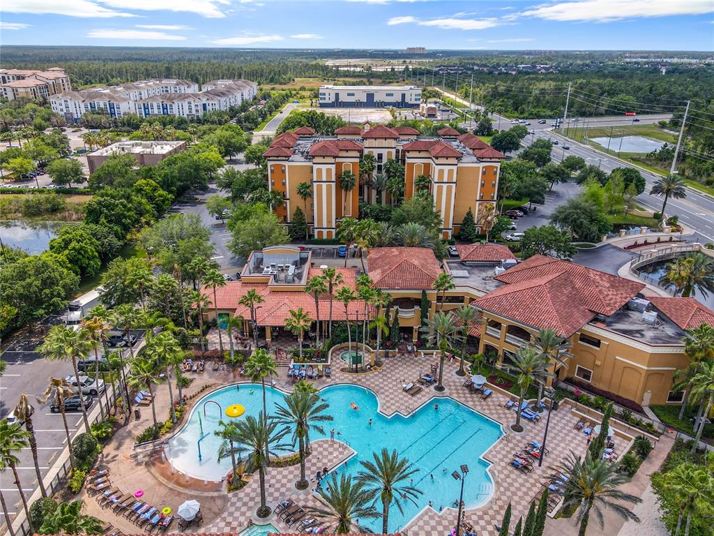 an aerial view of residential houses and outdoor space