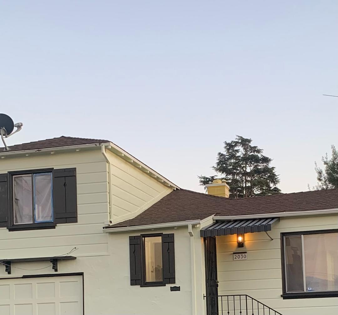 a front view of a house with a porch