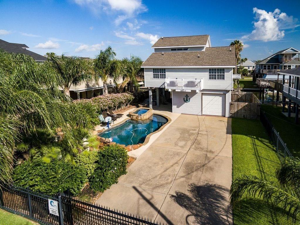 a view of a house with a swimming pool