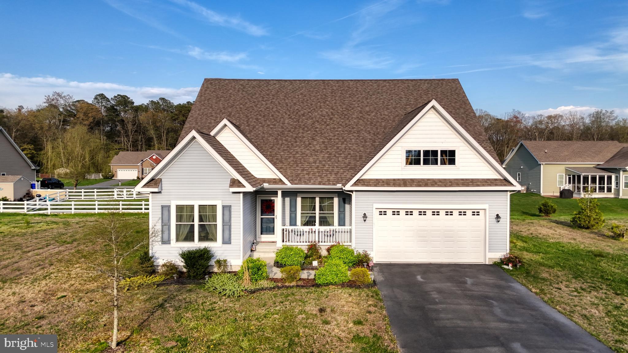 a view of front of house with a yard