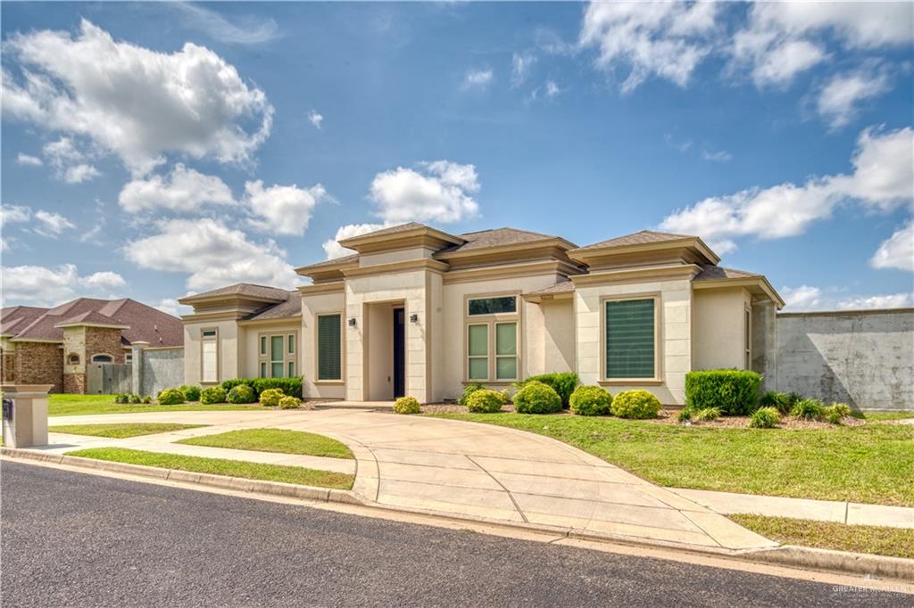 View of front of property featuring a front yard