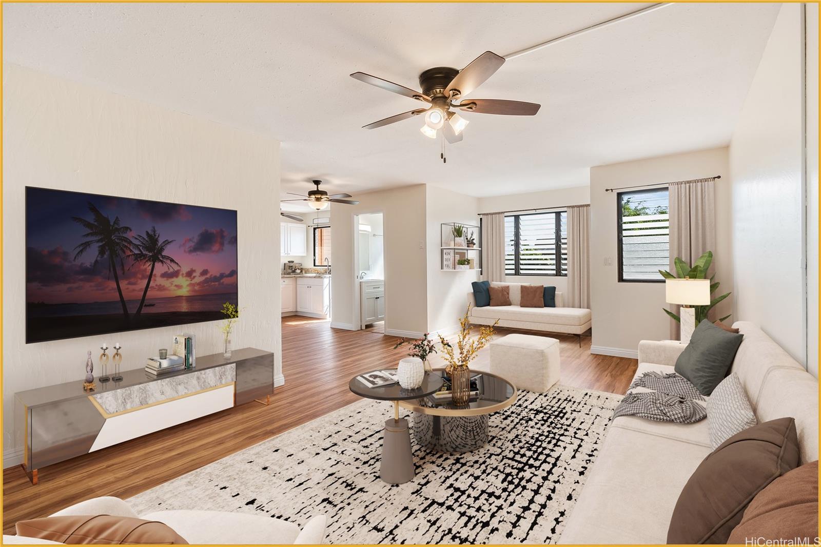 a living room with furniture and a flat screen tv