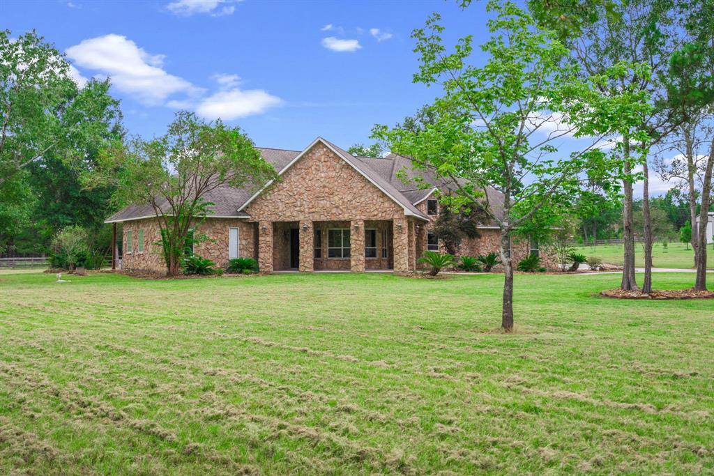 a front of a house with a garden