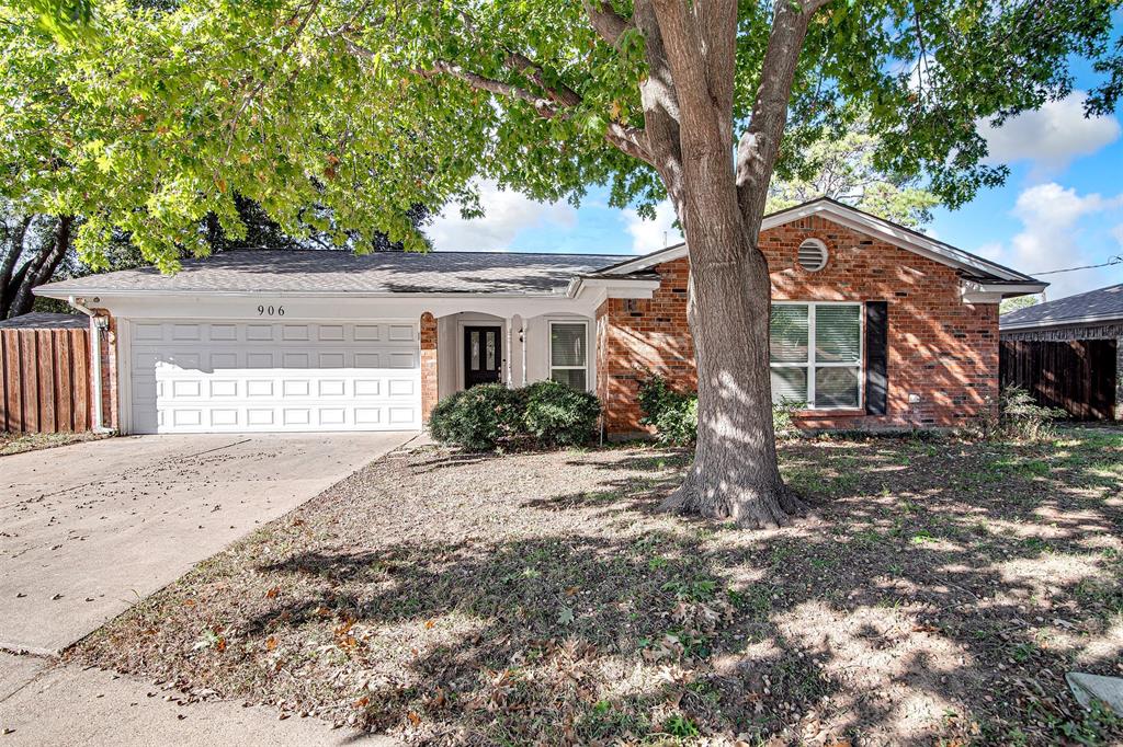 a house with a tree in front of it