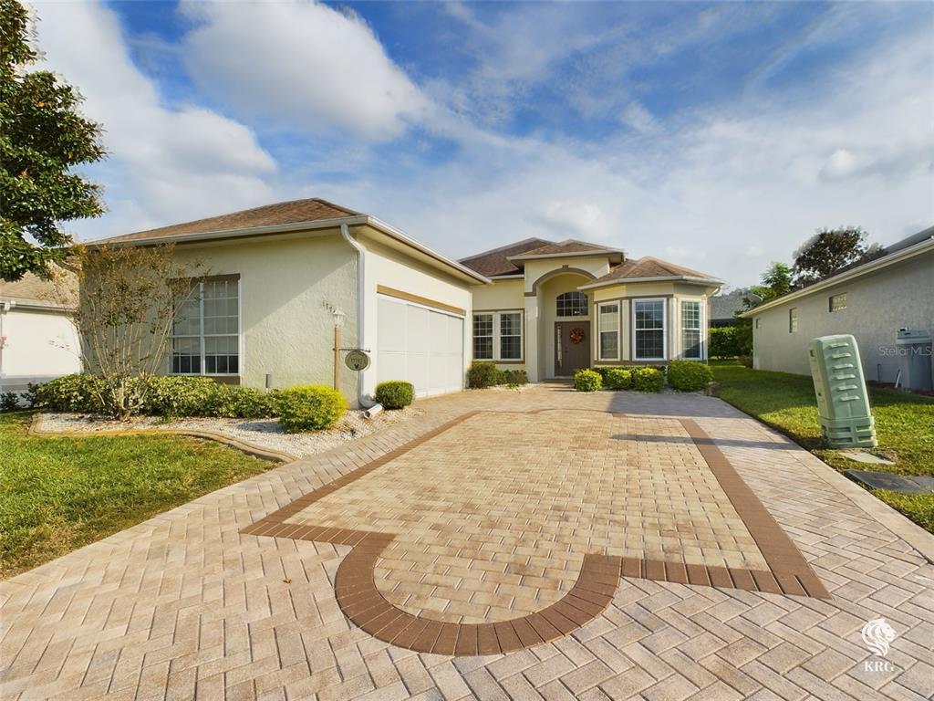 a front view of a house with yard