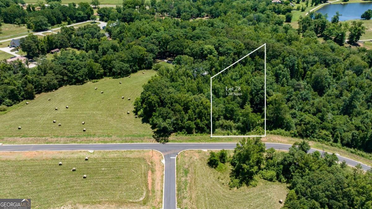 a view of a field with an outdoor space