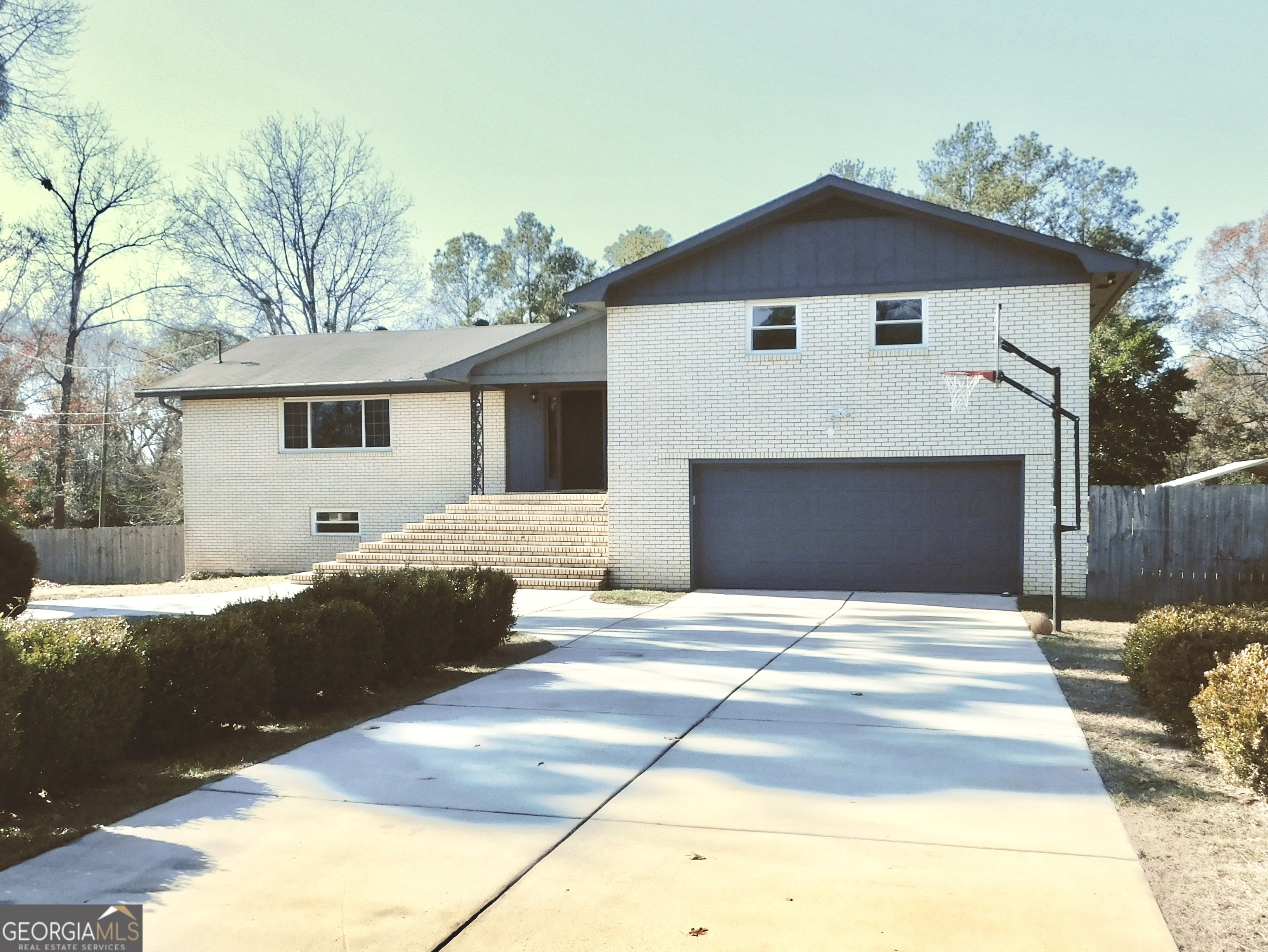 a front view of a house with yard