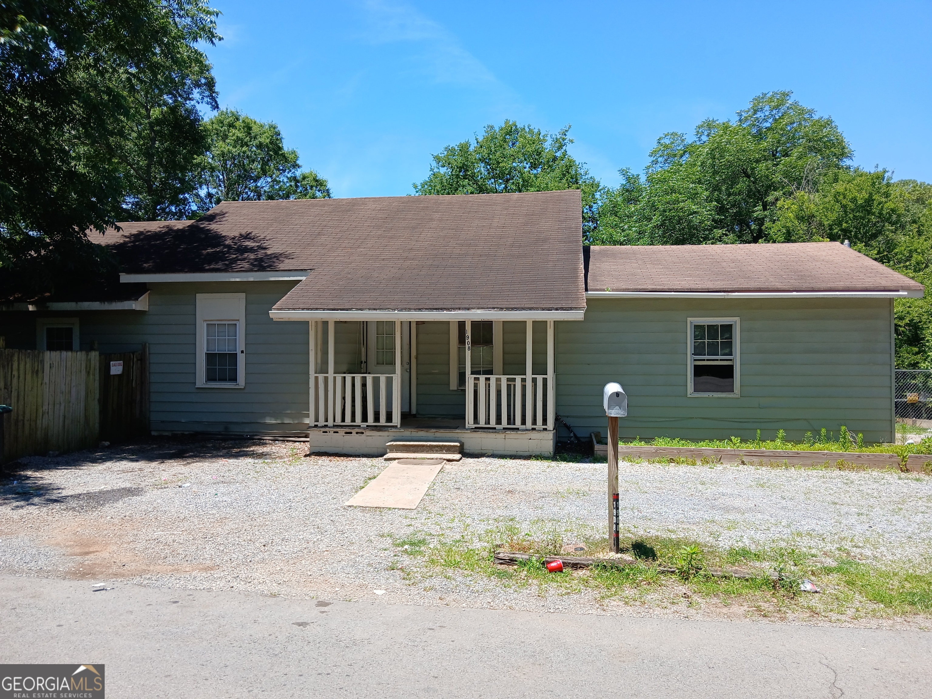 a front view of a house with yard