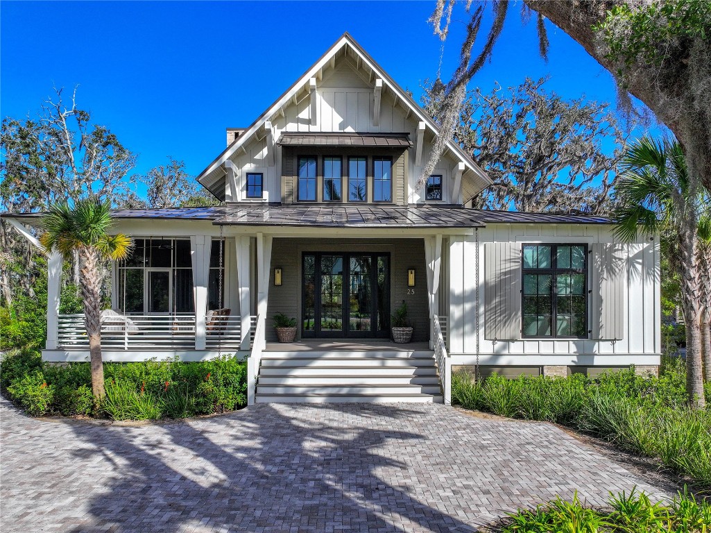 front view of a house with a small yard