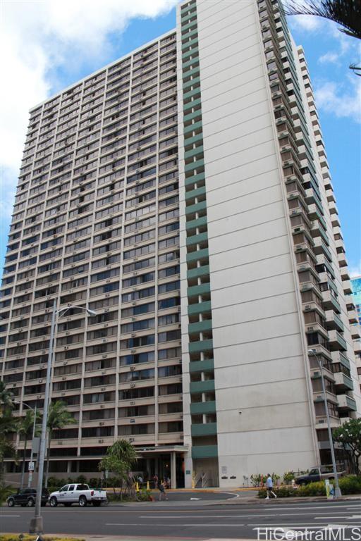 a front view of a building with glass windows