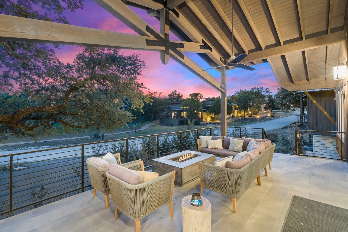 a view of a chairs and table in the patio