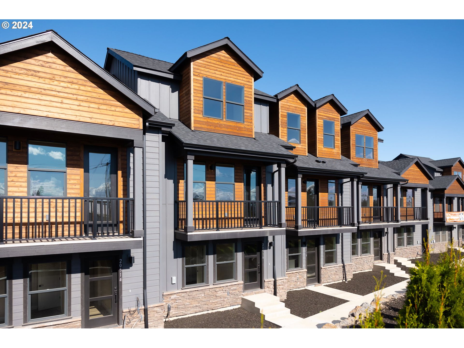 a front view of residential houses