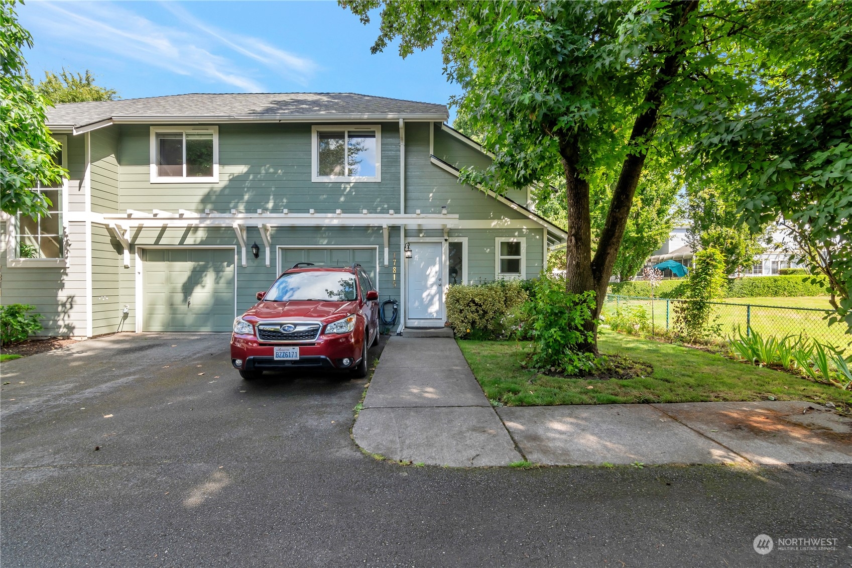 a car parked in front of a house