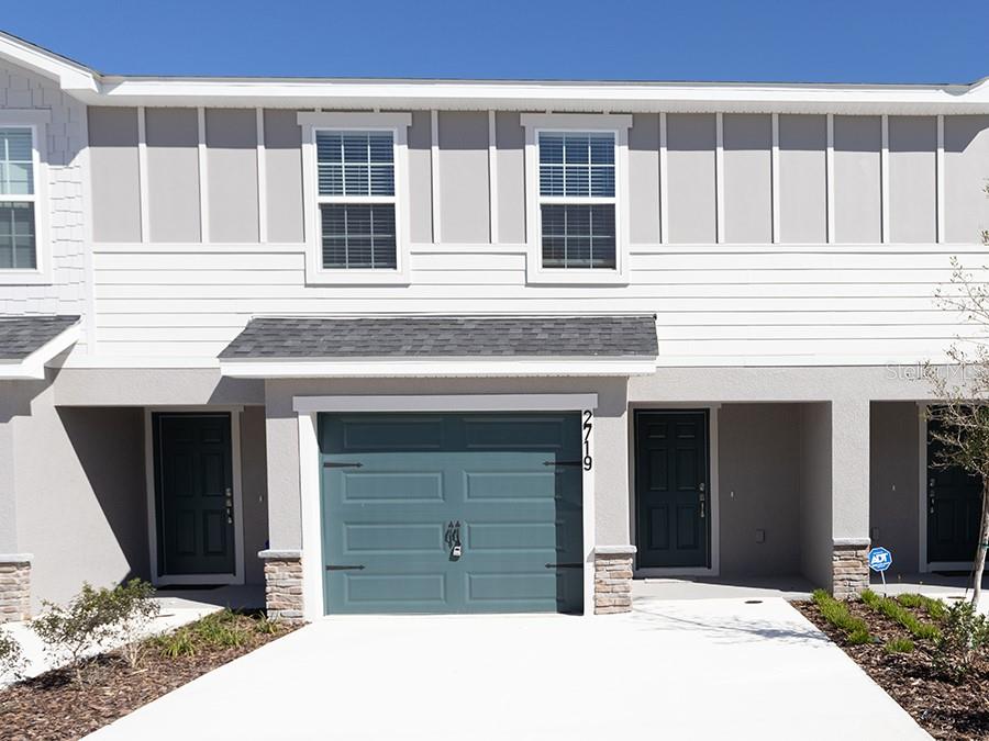 a house view with a outdoor space