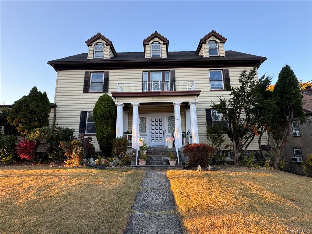 a front view of house with yard