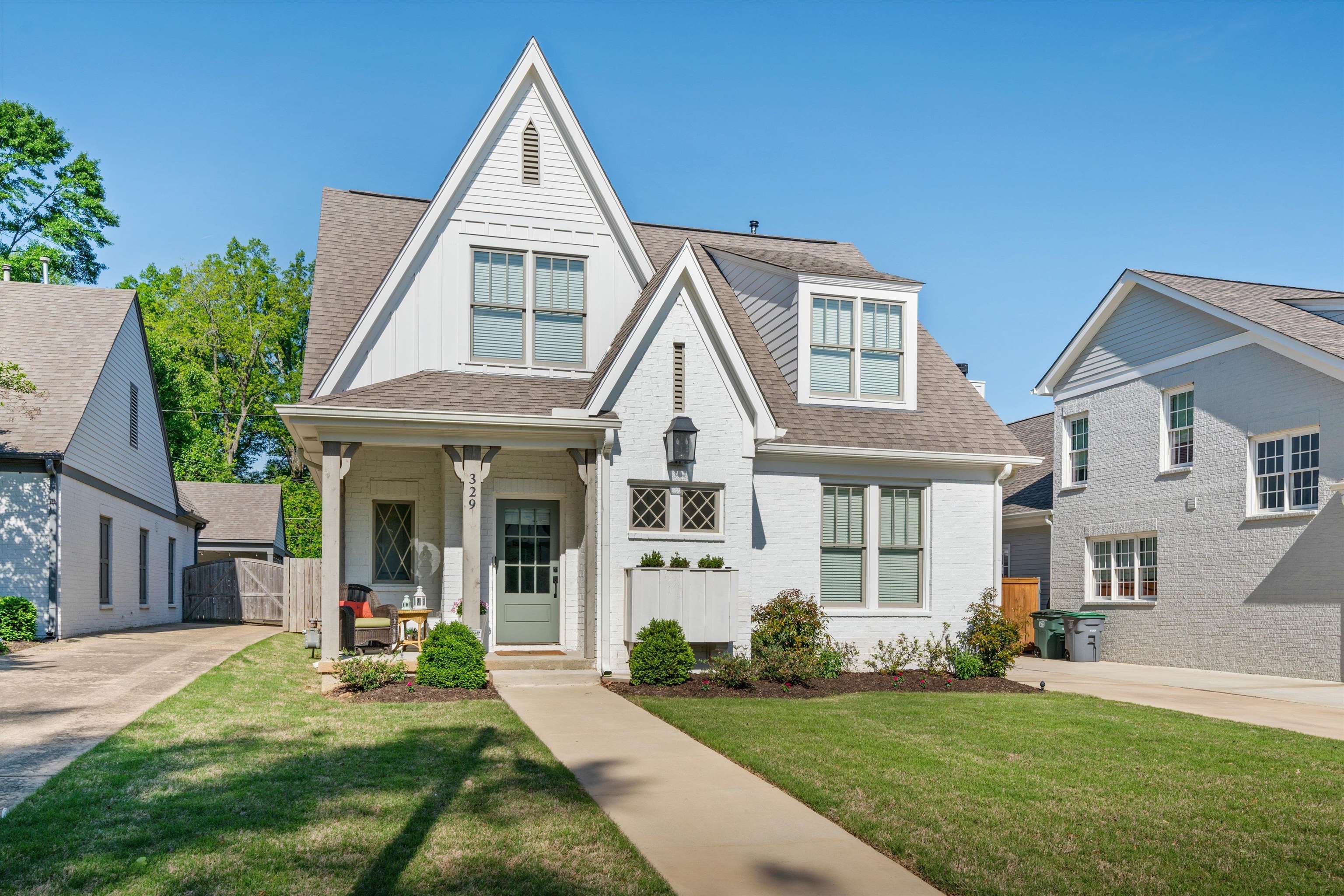 front view of a house with a yard