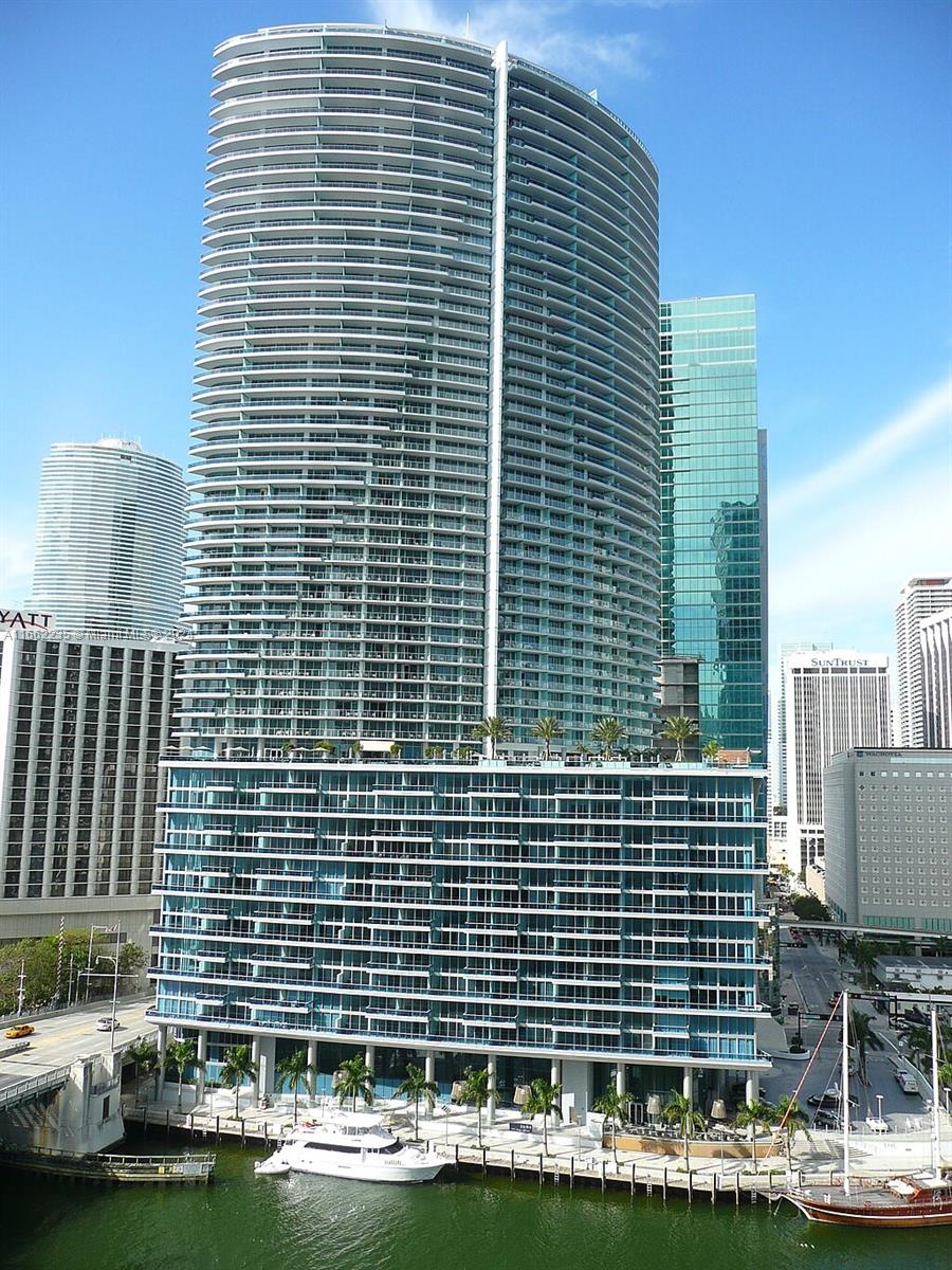 a front view of a building with glass windows