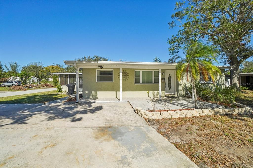 a view of a house with a patio