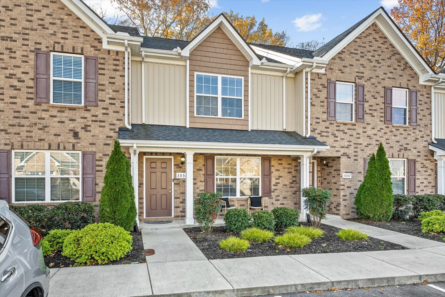 a front view of a house with garden