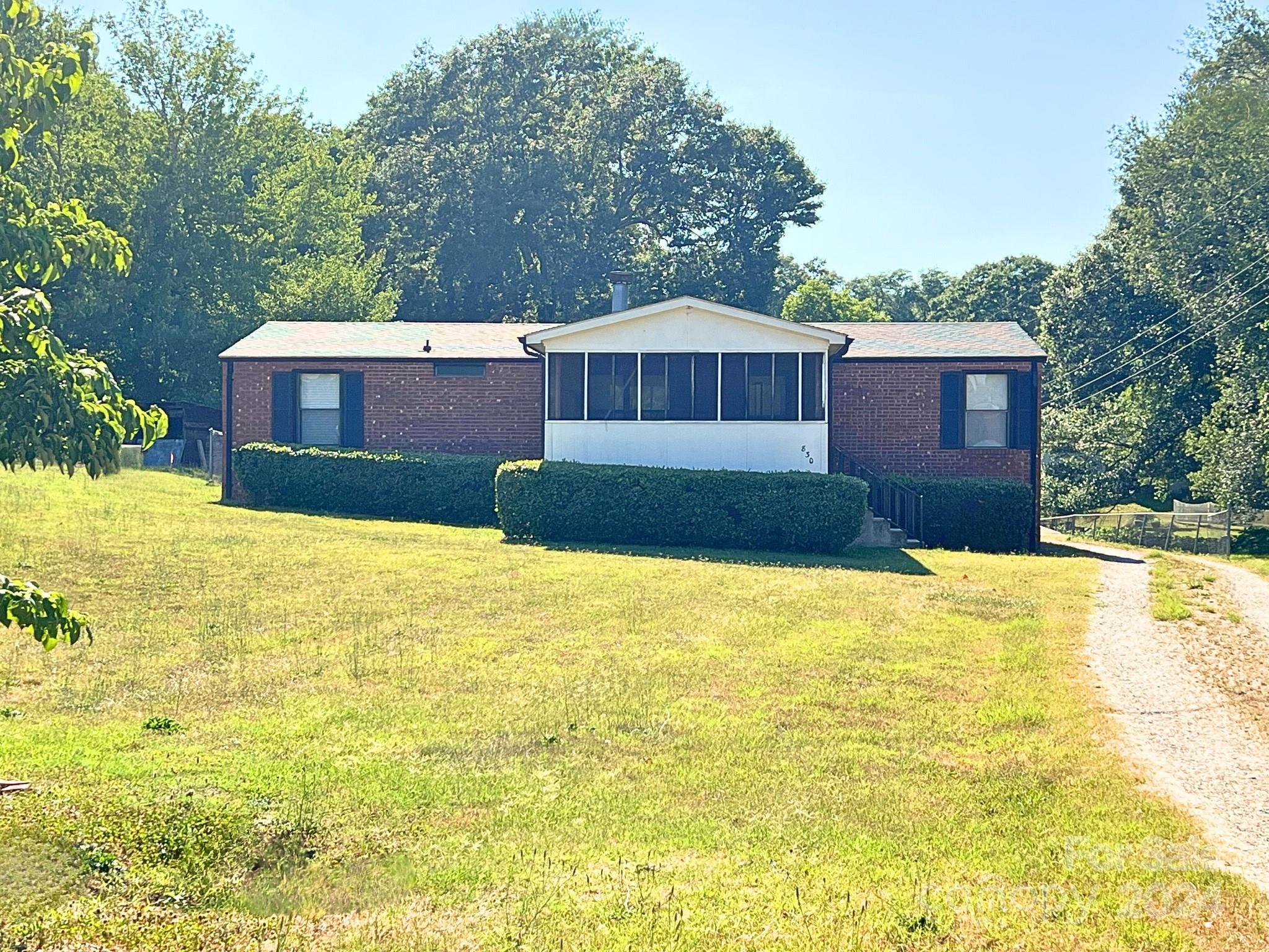 a front view of a house with swimming pool