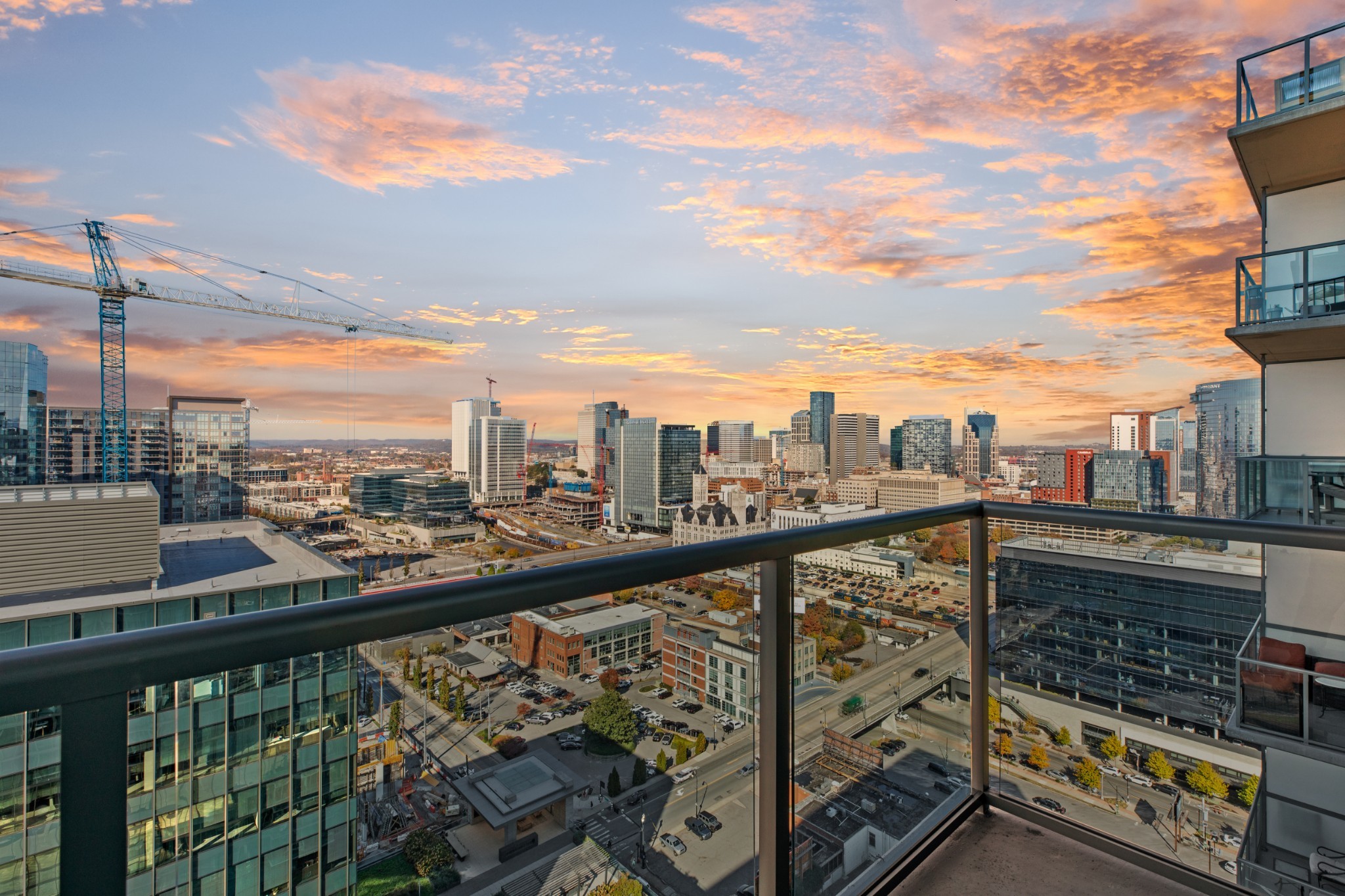 a view of a city skyline from a balcony