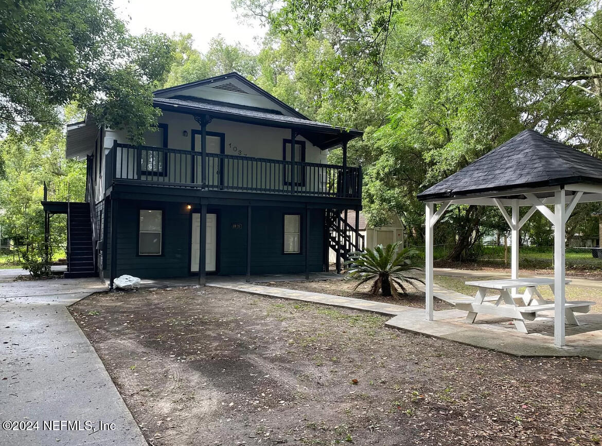 a front view of a house with a porch