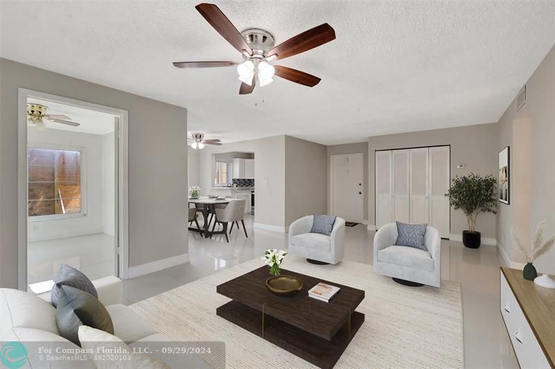 a living room with furniture and a table