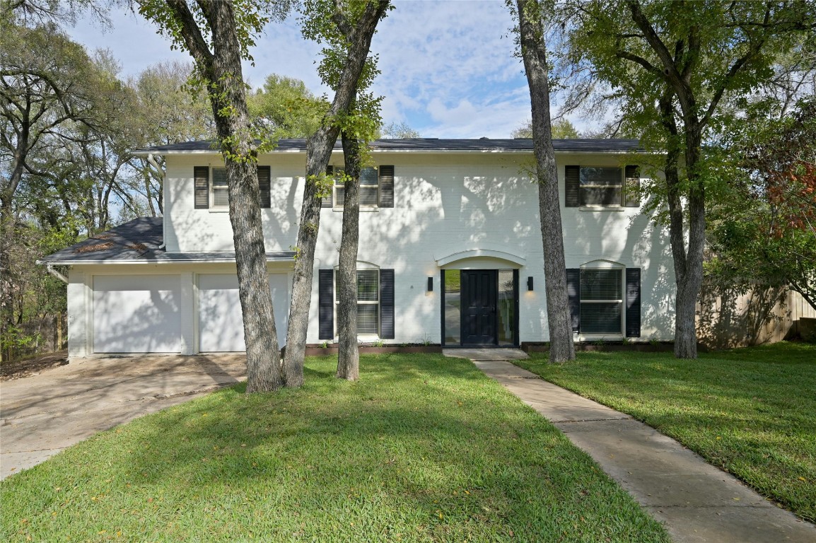 a front view of house with yard