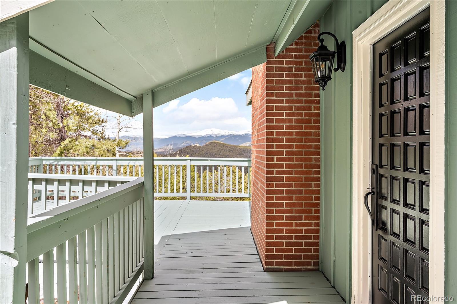 a view of a balcony with city view