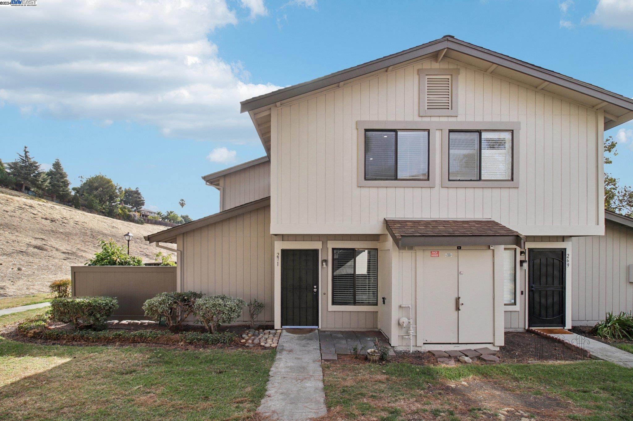 a front view of house with garage