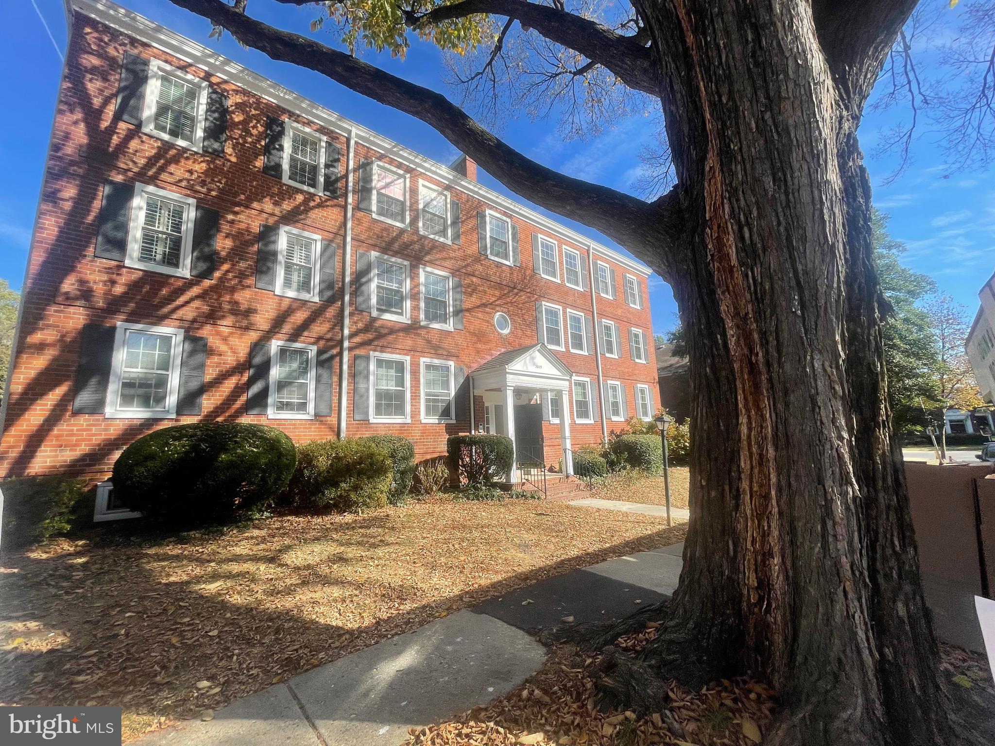 a view of a building with a street