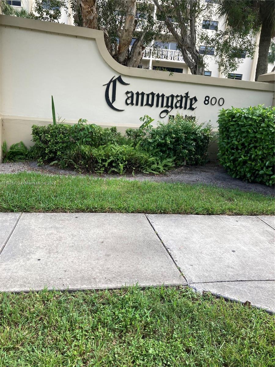 a view of a bench in front of a building